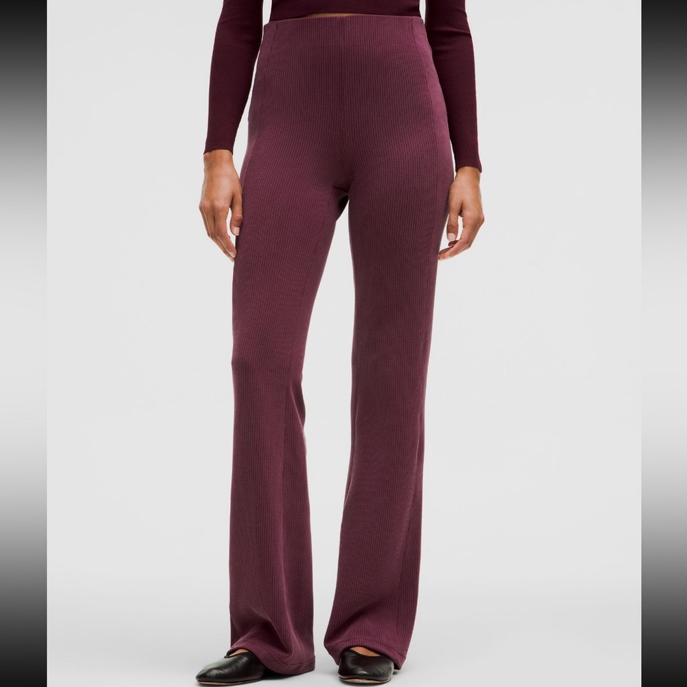 37. Lululemon Ribbed Softstreme Flared Pant Regular in garnet red